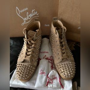 Authentic Louboutin classic tan high top spike sneaker.